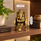 Handcrafted Brass Ganesha on Rocking Chair – Antique Finish